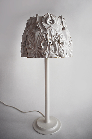 White glazed decorative ceramic lamp.